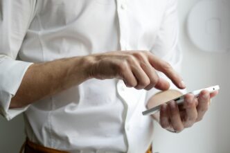 Person using a digital wallet app on a smartphone